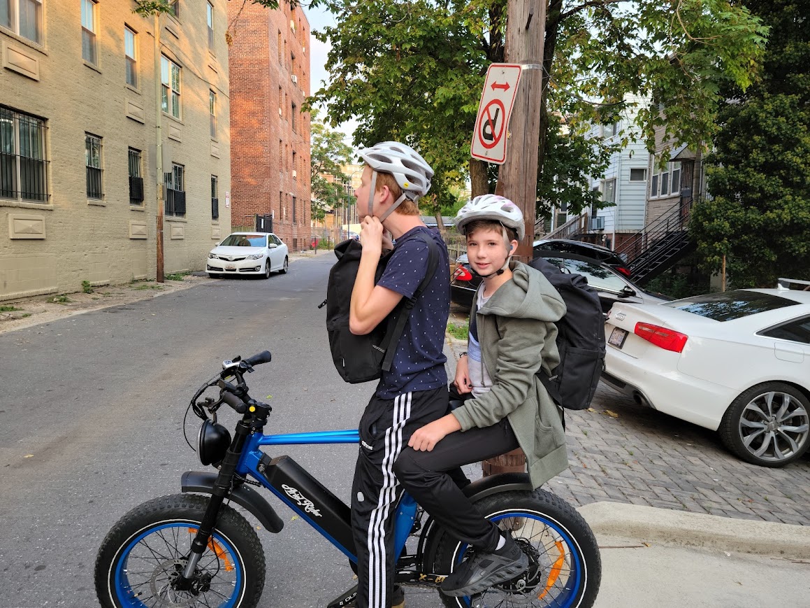 Me taking will to school on my bike.